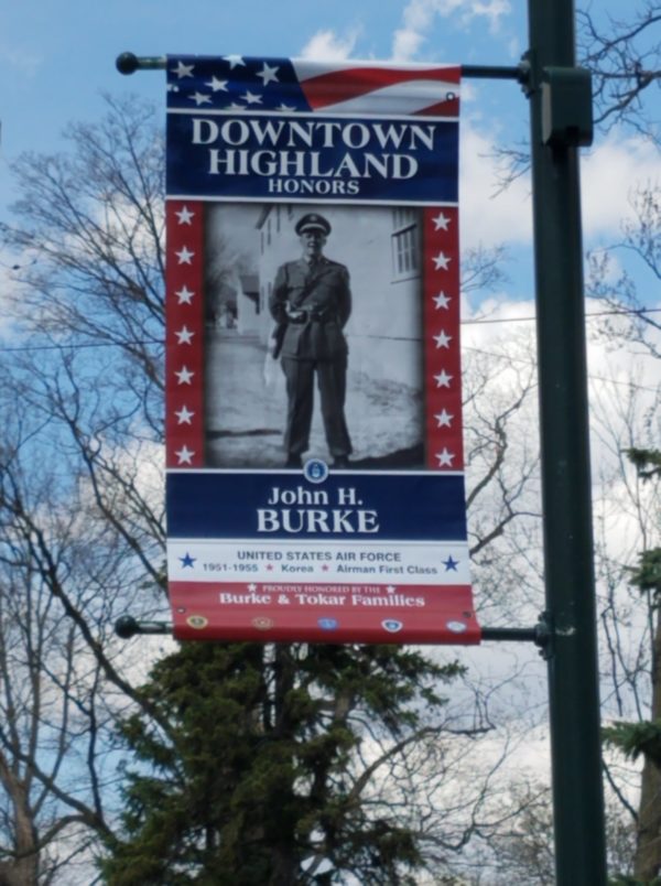 Veteran honored on banner in Downtown Highland.